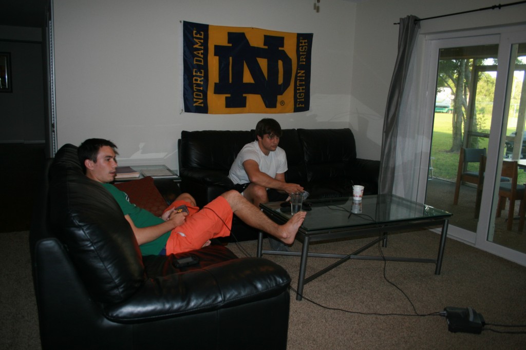 Ben Horton, left, and Matt Cirillo play video games afterschool before working on lesson plans and other classroom preparations.