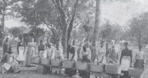 Girls washing laundry outside the Orange Park school. Clay County archives