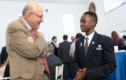 Cristo Rey administrator and student